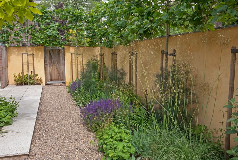 Courtyard garden with gravel paths and naturalistic plantings