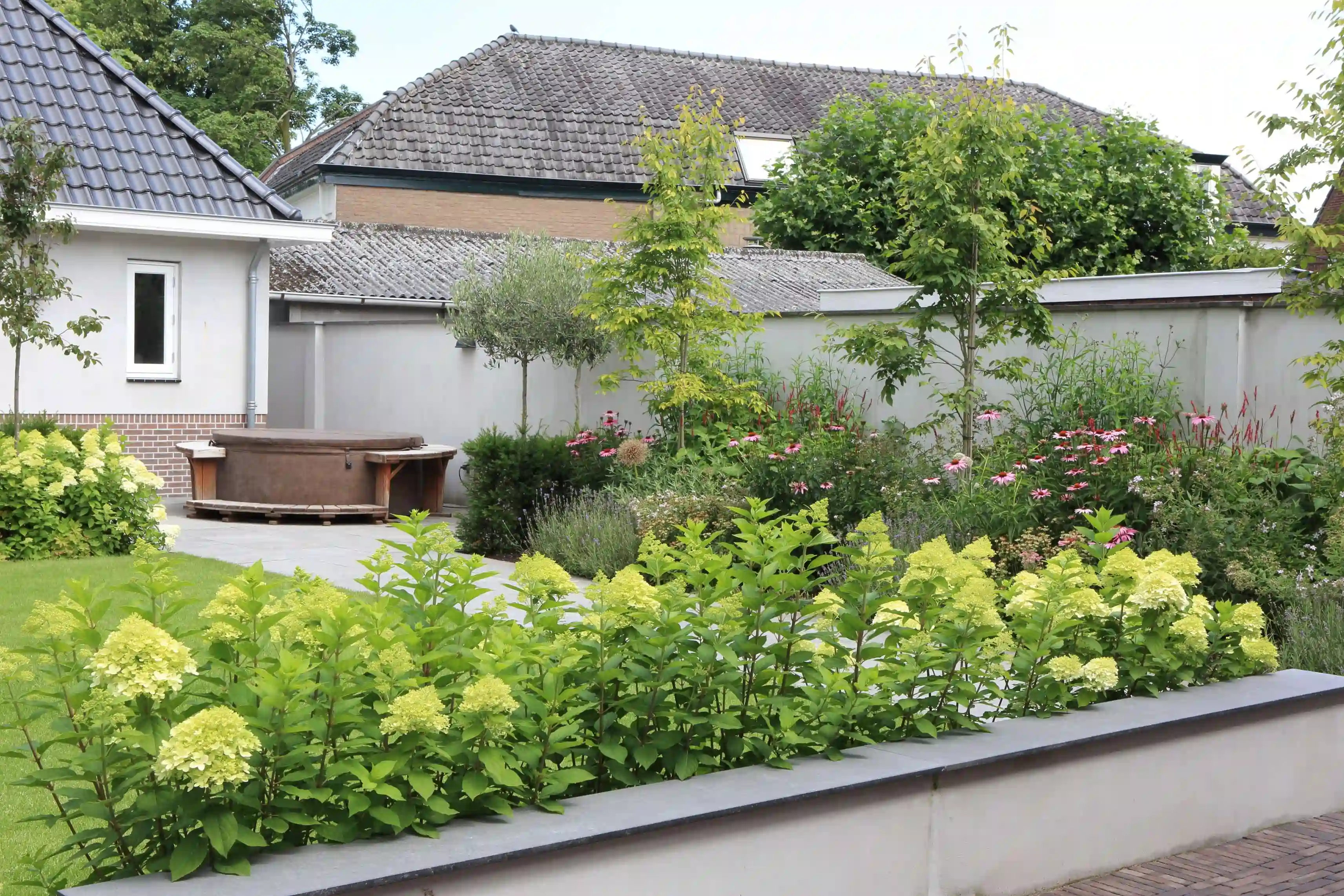 Overview of entire garden with terrace and plantings